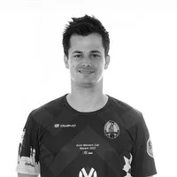 A man wears a customized black and white sports jersey with a geometric pattern, the owayo logo, a club crest, and the text 'Euro Winners Cup Nazaré 2022'.